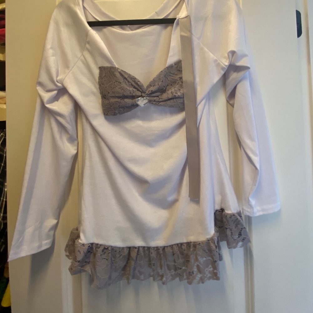 White and grey blouse with a bow on the back